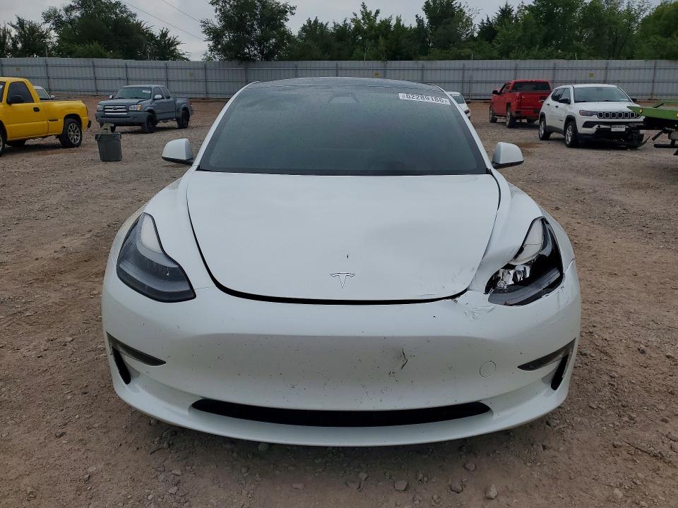 Photo 5 from auction – 2021 TESLA MODEL 3 with VIN 5YJ3E1EB4MF060238