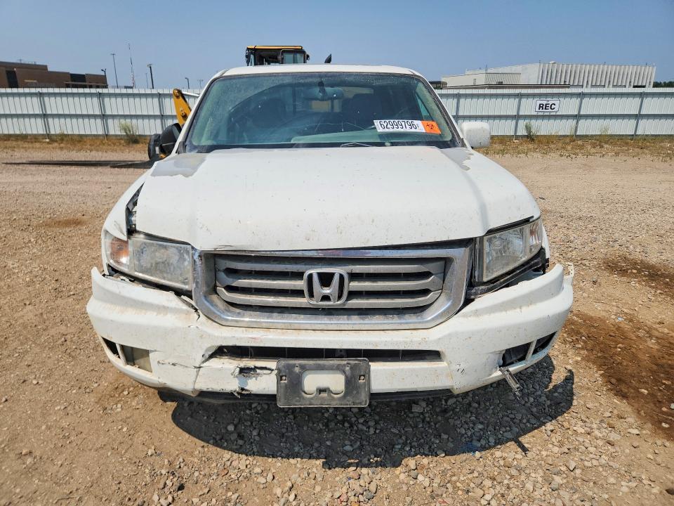 Photo 5 from auction – 2014 HONDA RIDGELINE with VIN 5FPYK1F50EB009870