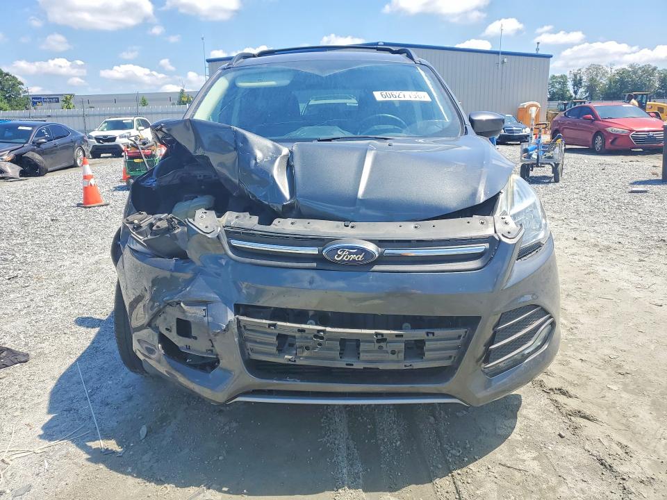 Photo 5 from auction – 2016 FORD ESCAPE with VIN 1FMCU0G92GUC50652