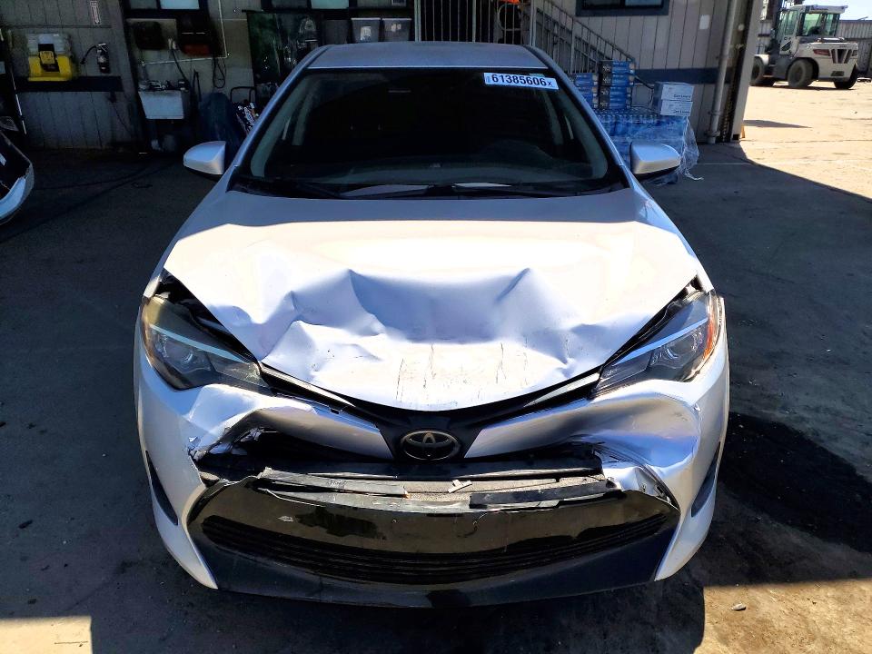 Photo 5 from auction – 2019 TOYOTA COROLLA with VIN 5YFBURHE1KP899512