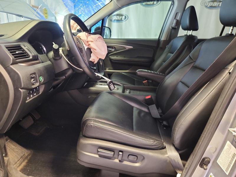 Photo 7 from auction – 2022 HONDA RIDGELINE with VIN 5FPYK3F75NB017816