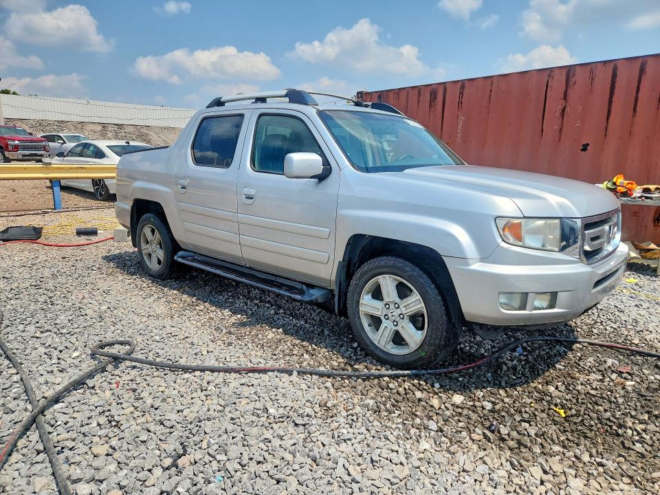 Photo 4 from auction – 2011 HONDA RIDGELINE with VIN 5FPYK1F50BB007273