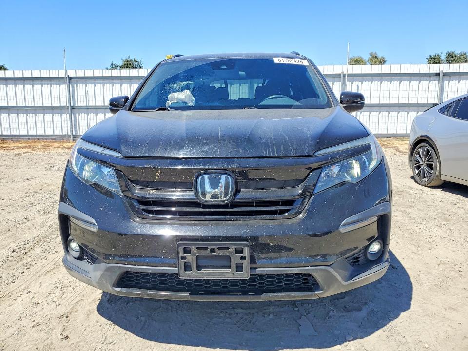 Photo 5 from auction – 2022 HONDA PILOT with VIN 5FNYF5H39NB032256