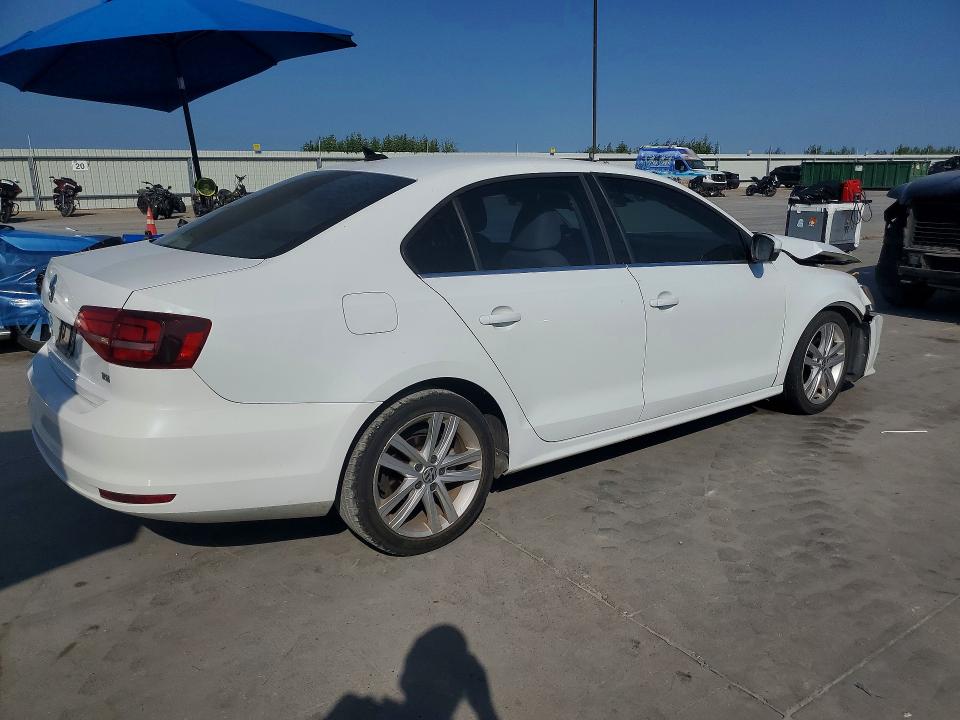 Photo 3 from auction – 2015 VOLKSWAGEN JETTA with VIN 3VWLA7AJ1FM412828