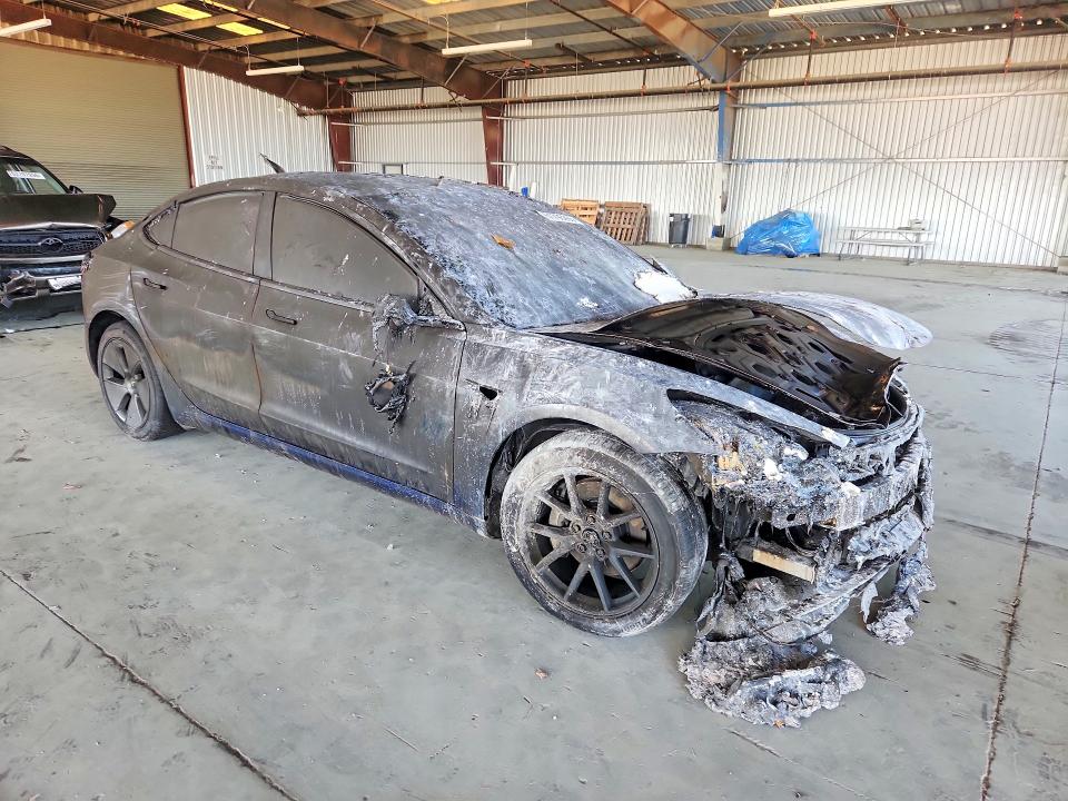 Photo 4 from auction – 2023 TESLA MODEL 3 with VIN 5YJ3E1EB1PF713516