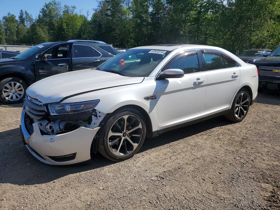 FORD TAURUS 2014 with VIN 1FAHP2H8XEG180693 - Photo from auction