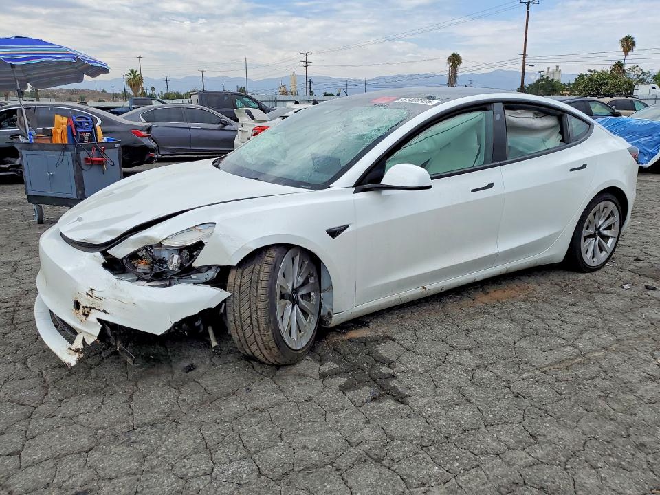 TESLA MODEL 3 2023 with VIN 5YJ3E1EA7PF599996 - Photo from auction