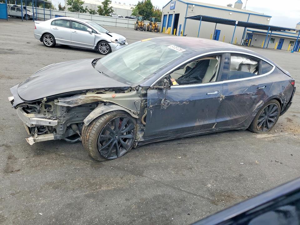 TESLA MODEL 3 2018 with VIN 5YJ3E1EB9JF147287 - Photo from auction