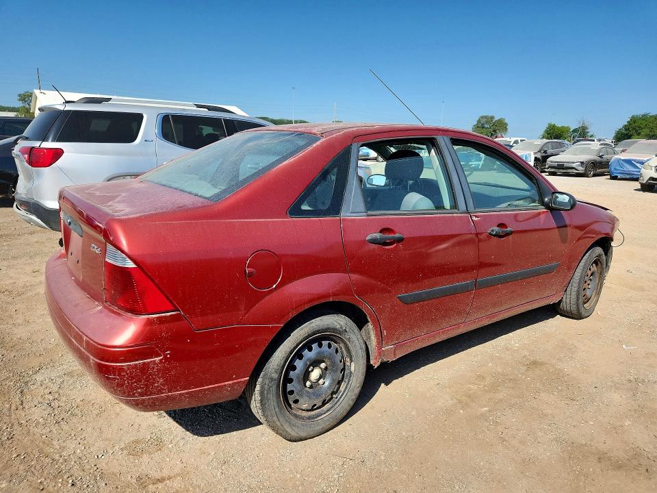 Photo 3 from auction – 2005 FORD FOCUS with VIN 1FAFP34N65W130825