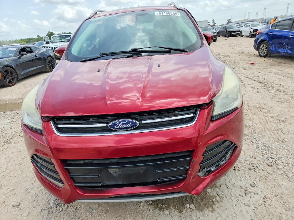 Photo 5 from auction – 2016 FORD ESCAPE with VIN 1FMCU0JX0GUA83859