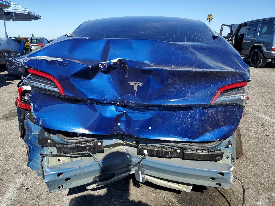 Снимка 6 от търг – 2018 TESLA MODEL 3 с VIN 5YJ3E1EA6JF047039