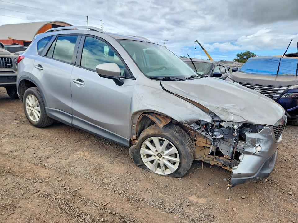 Photo 4 from auction – 2014 MAZDA CX-5 with VIN JM3KE2BE0E0320433