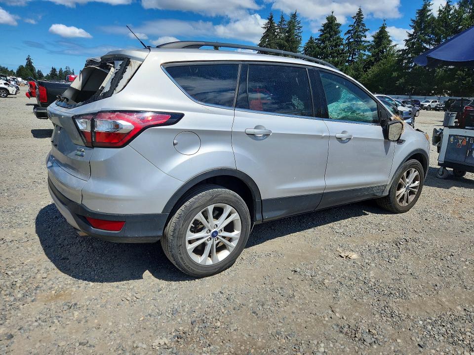 Photo 3 from auction – 2018 FORD ESCAPE with VIN 1FMCU9HD7JUC89459