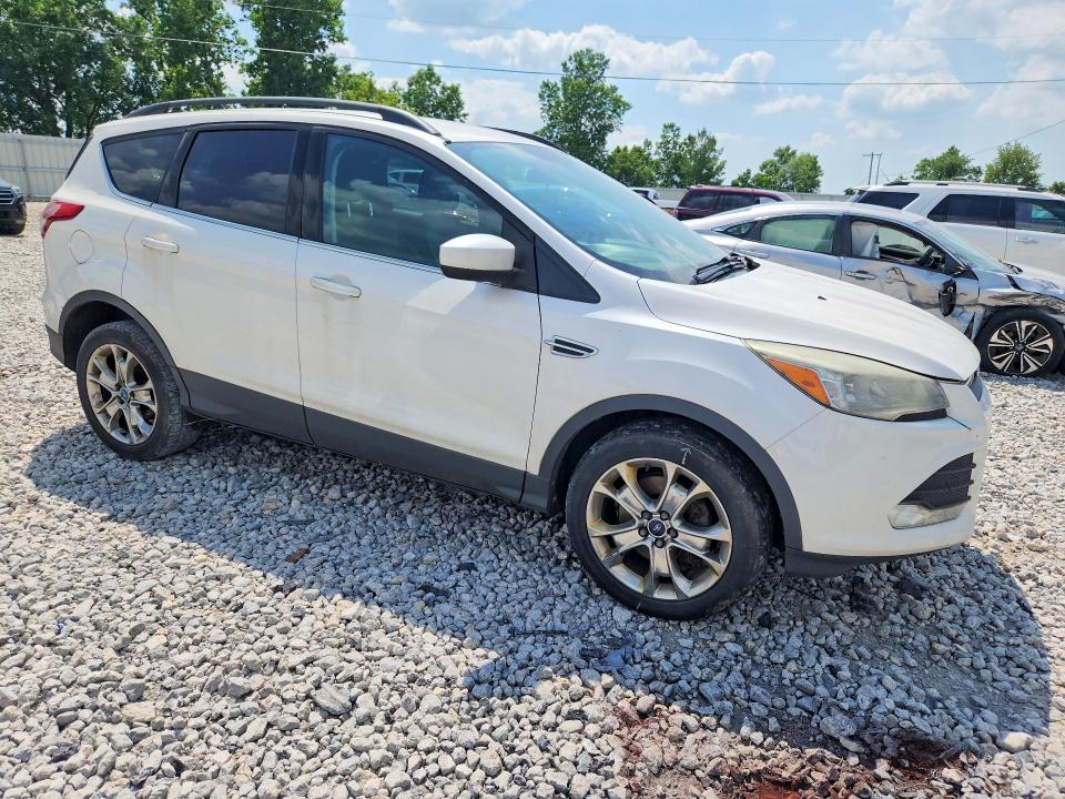 Photo 4 from auction – 2014 FORD ESCAPE with VIN 1FMCU9G95EUB82591