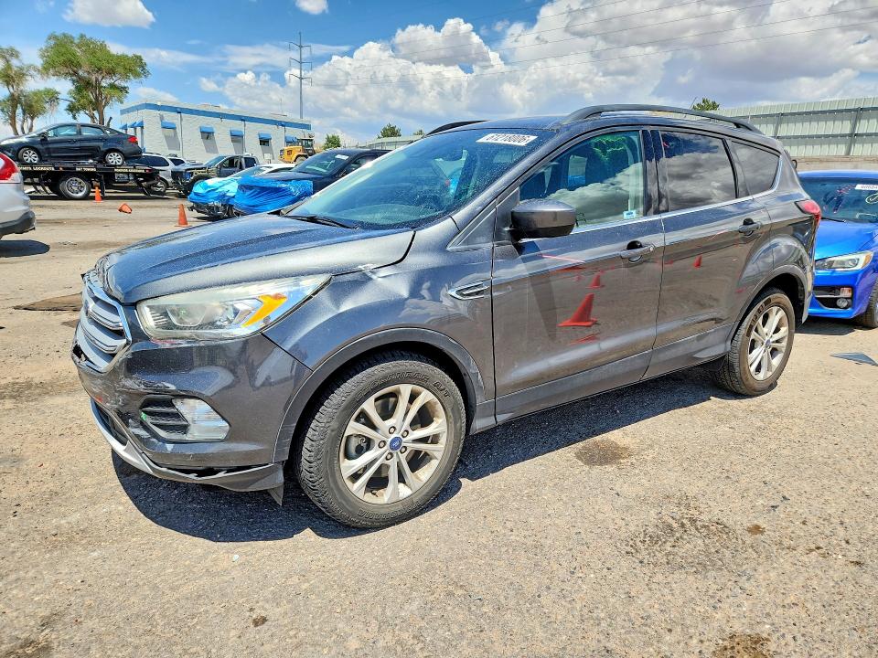 FORD ESCAPE 2019 with VIN 1FMCU9HD1KUA35182 - Photo from auction
