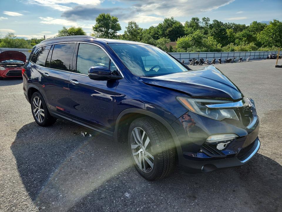 Photo 4 from auction – 2016 HONDA PILOT with VIN 5FNYF6H05GB118839