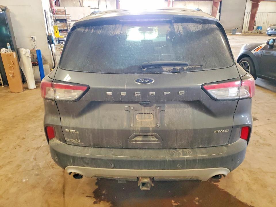 Photo 6 from auction – 2021 FORD ESCAPE with VIN 1FMCU9H98MUA03196