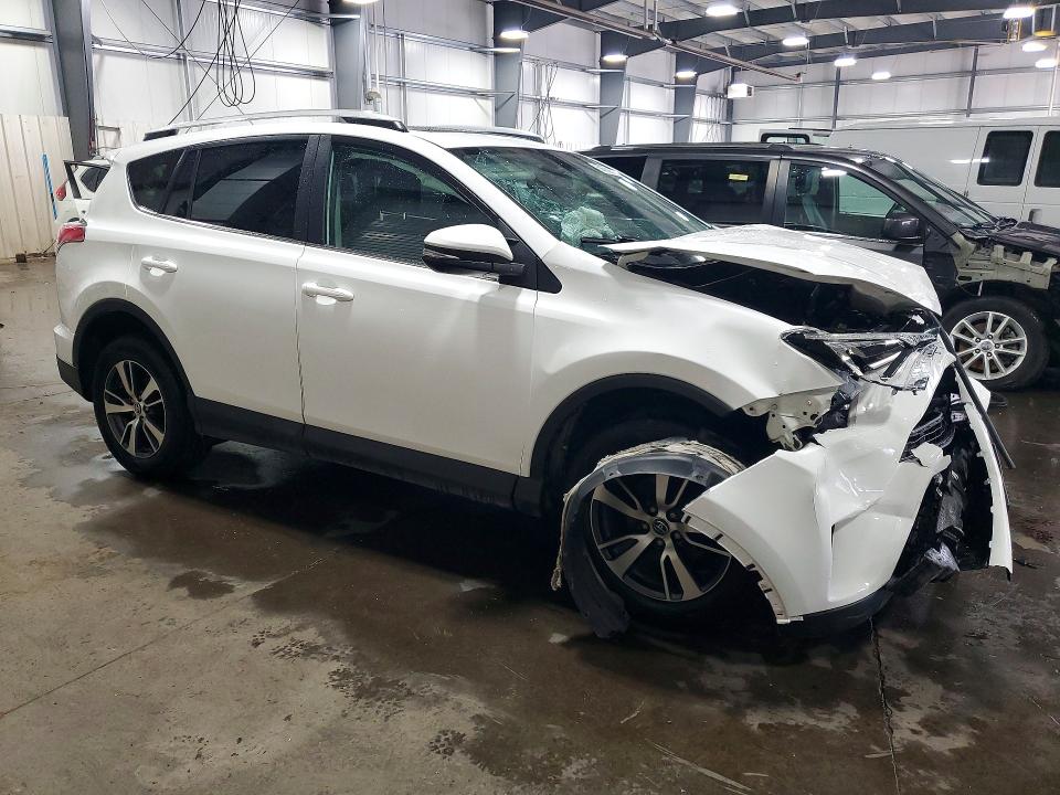 Photo 4 from auction – 2016 TOYOTA RAV4 with VIN 2T3RFREV9GW534702