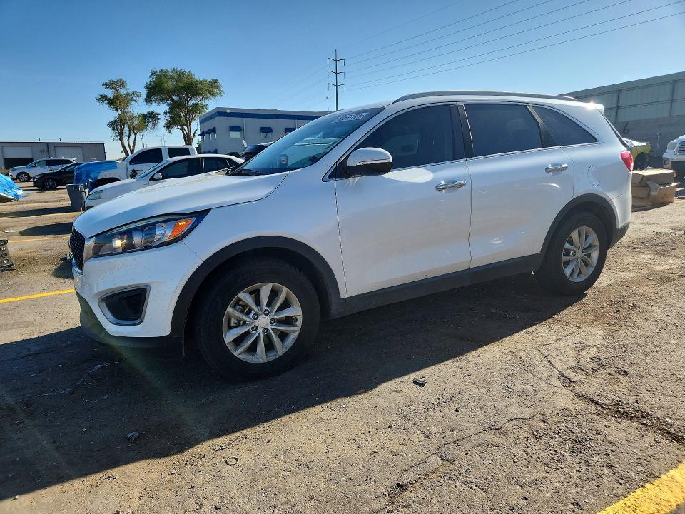 KIA SORENTO 2016 with VIN 5XYPG4A38GG152588 - Photo from auction