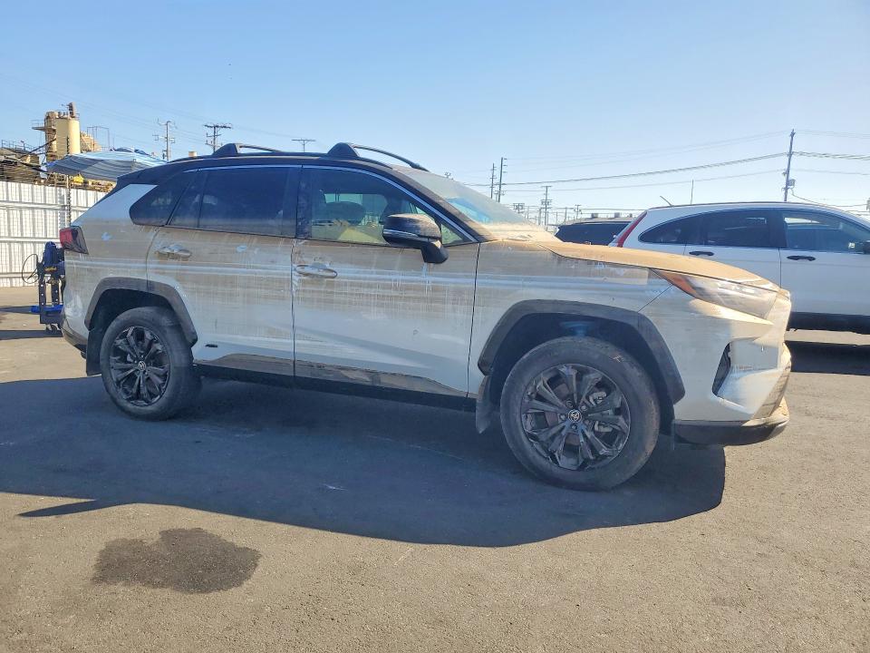 Photo 4 from auction – 2023 TOYOTA RAV4 with VIN 4T3E6RFV7PU107192