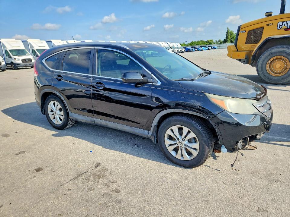 Photo 4 from auction – 2012 HONDA CR-V with VIN JHLRM3H73CC011529
