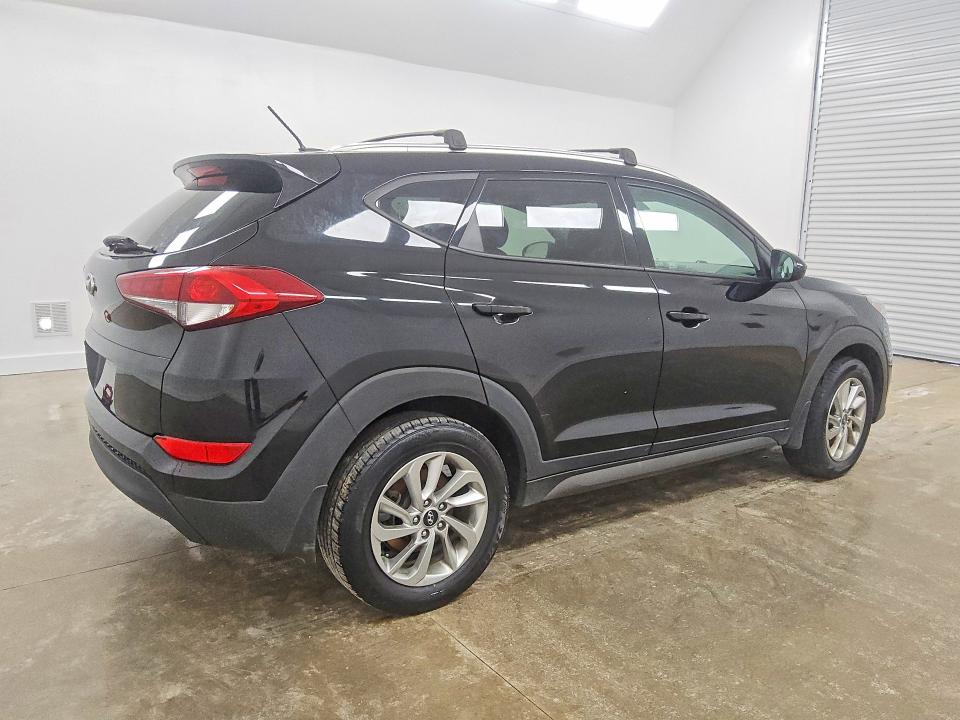 Photo 3 from auction – 2016 HYUNDAI TUCSON with VIN KM8J33A44GU230461