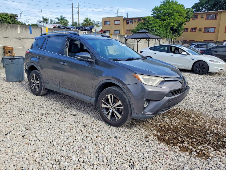 Photo 4 from auction – 2018 TOYOTA RAV4 with VIN 2T3WFREV8JW511728