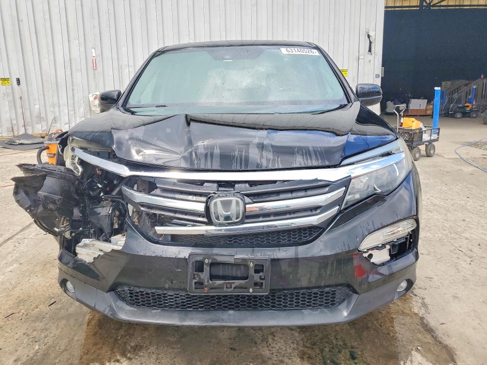 Photo 5 from auction – 2016 HONDA PILOT with VIN 5FNYF6H67GB097240