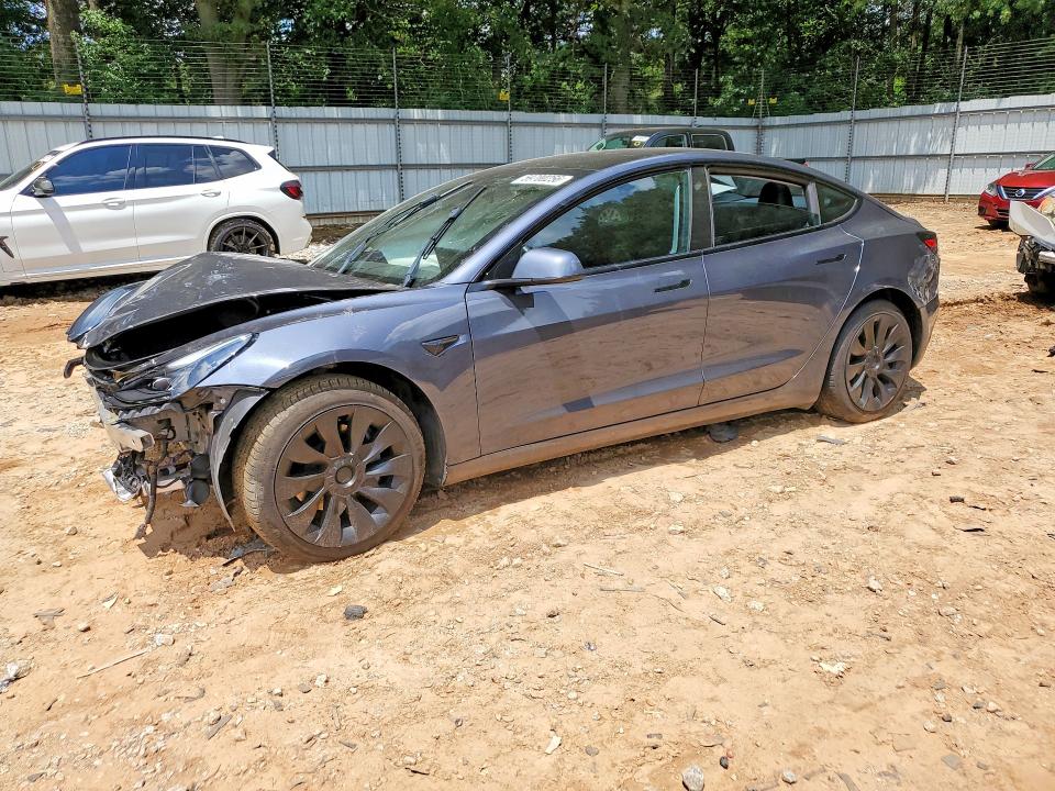 TESLA MODEL 3 2022 with VIN 5YJ3E1EB9NF164502 - Photo from auction
