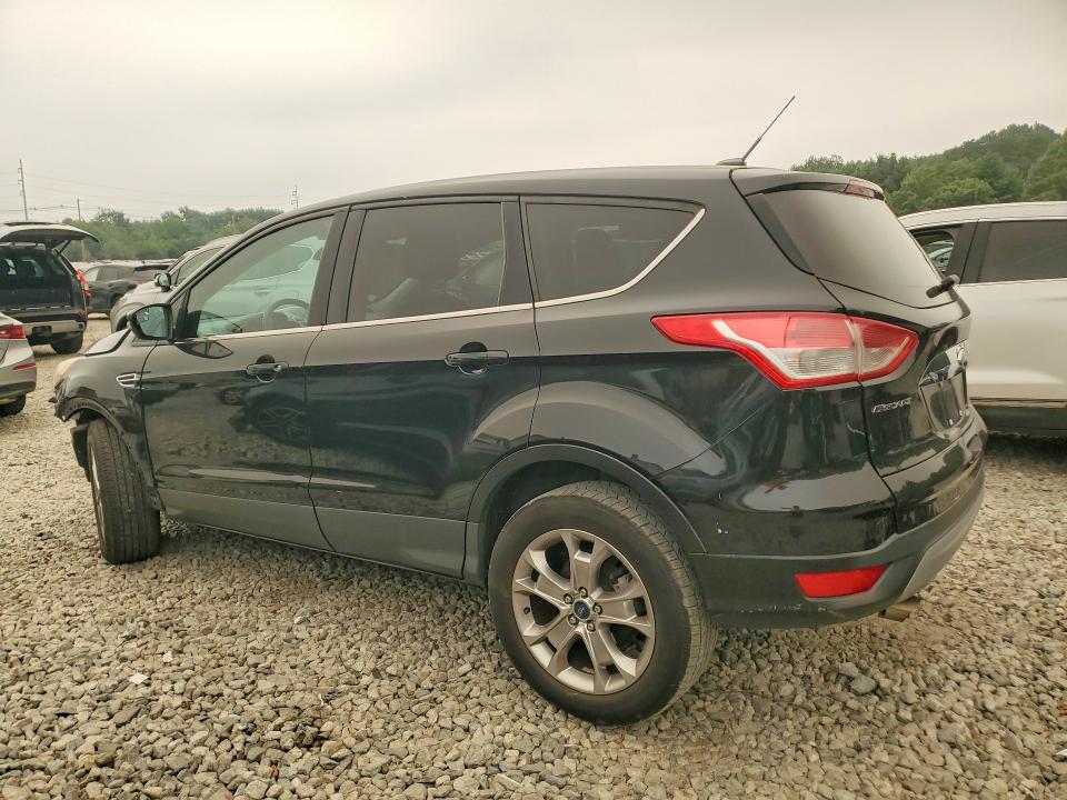 Photo 2 from auction – 2013 FORD ESCAPE with VIN 1FMCU9H92DUC47619