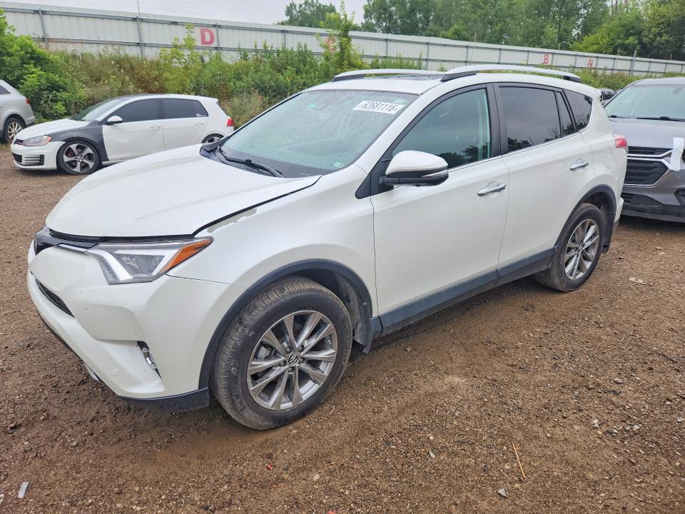 TOYOTA RAV4 2016 with VIN 2T3DFREV9GW461079 - Photo from auction