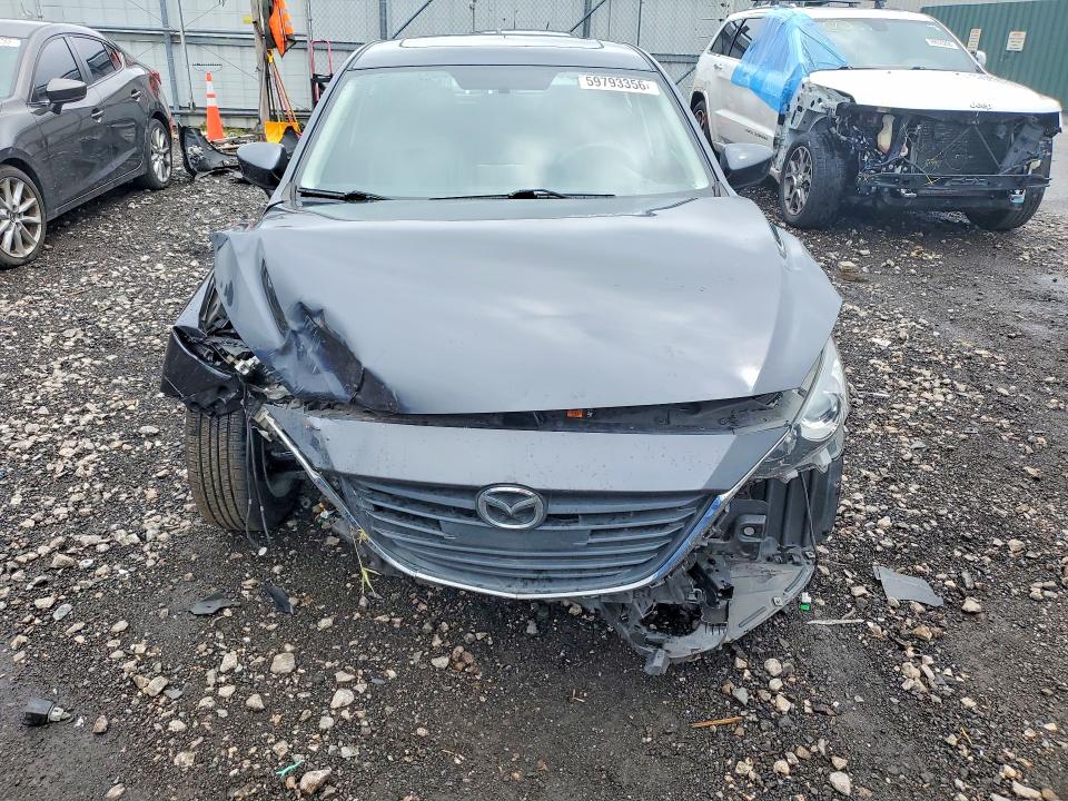 Photo 5 from auction – 2015 MAZDA 3 with VIN 3MZBM1M70FM185437