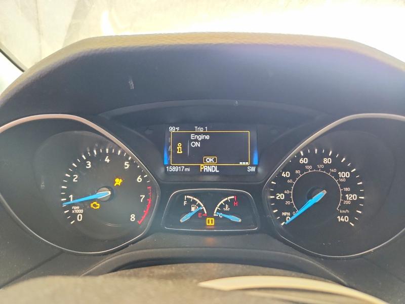 Photo 9 from auction – 2015 FORD FOCUS with VIN 1FADP3F21FL328810