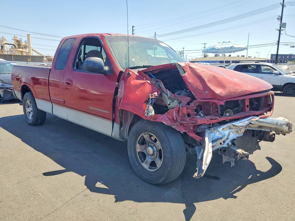 Photo 4 from auction – 2000 FORD F150 with VIN 1FTRX17W6YNB58053