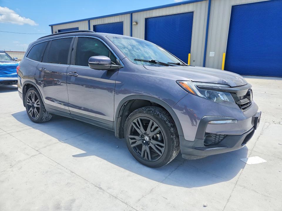 Photo 4 from auction – 2021 HONDA PILOT with VIN 5FNYF5H2XMB036497