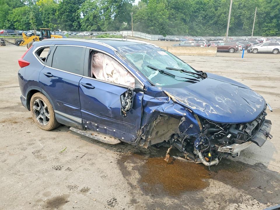 Photo 4 from auction – 2017 HONDA CR-V with VIN 5J6RW2H90HL024081