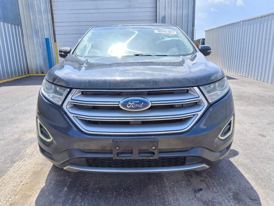 Photo 5 from auction – 2015 FORD EDGE with VIN 2FMTK4J9XFBB45285