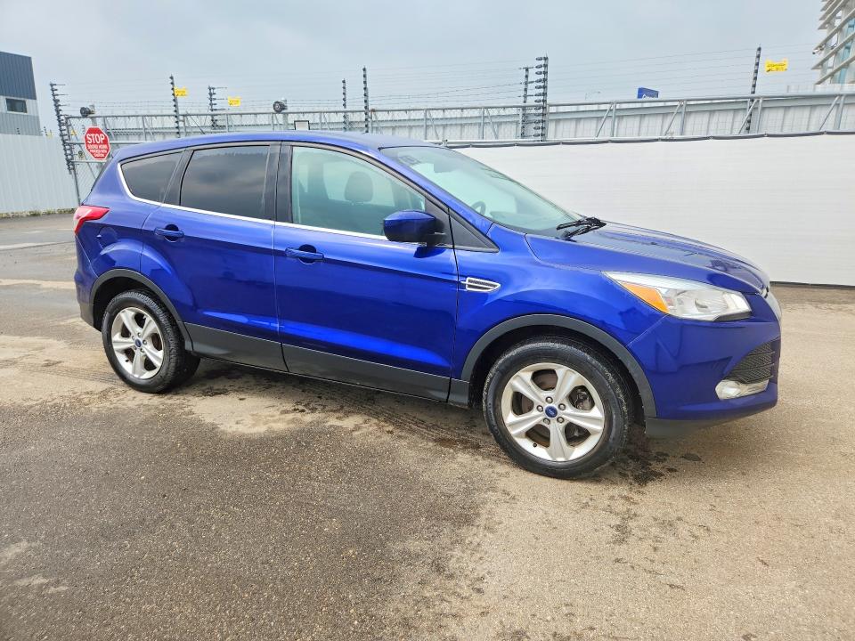 Photo 4 from auction – 2014 FORD ESCAPE with VIN 1FMCU9GX1EUC55261
