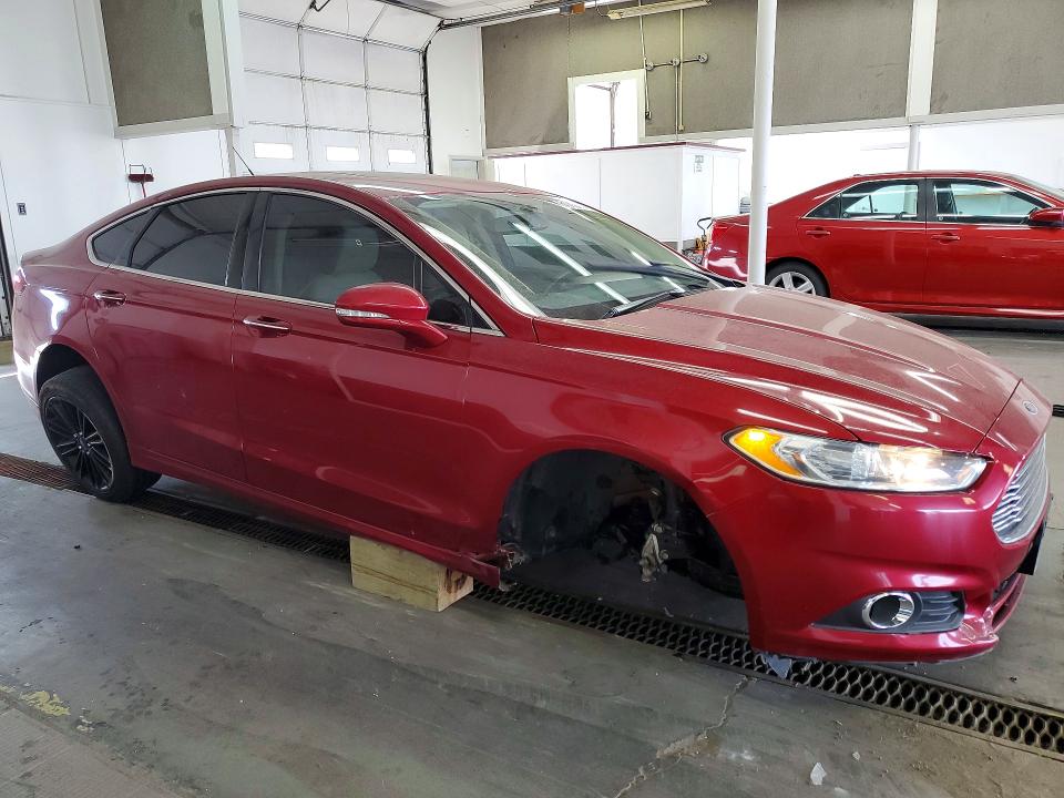 Photo 4 from auction – 2016 FORD FUSION with VIN 3FA6P0H92GR356622