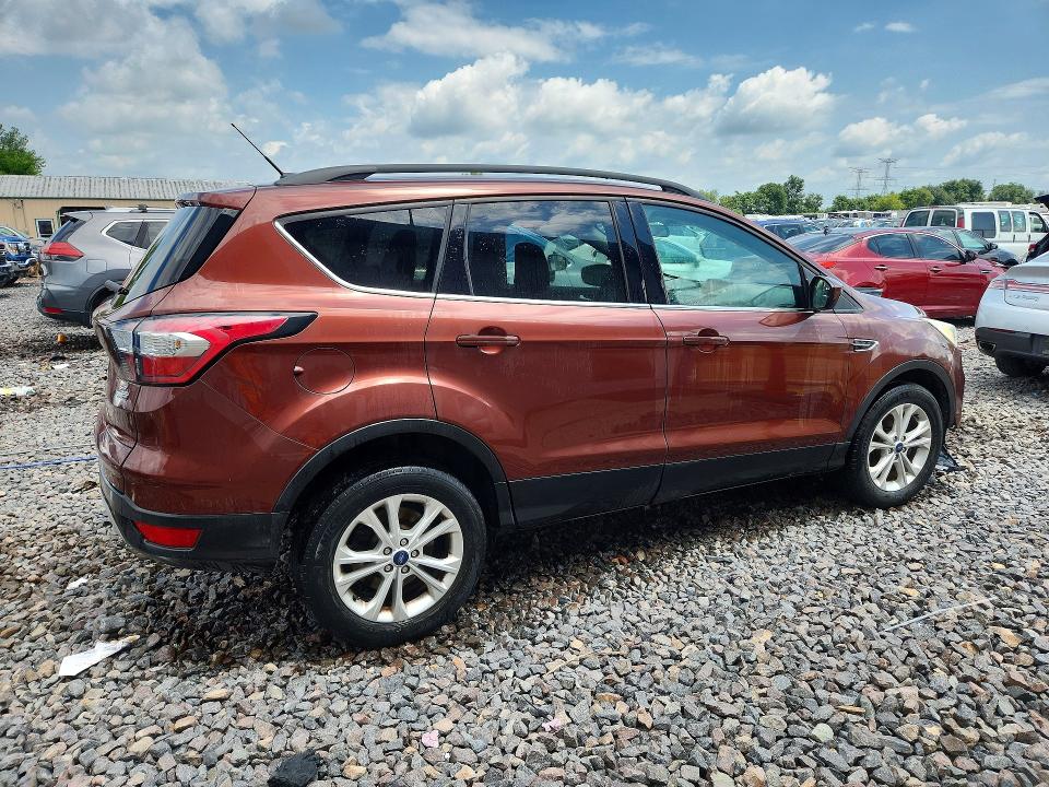 Photo 3 from auction – 2018 FORD ESCAPE with VIN 1FMCU9GD0JUA04974