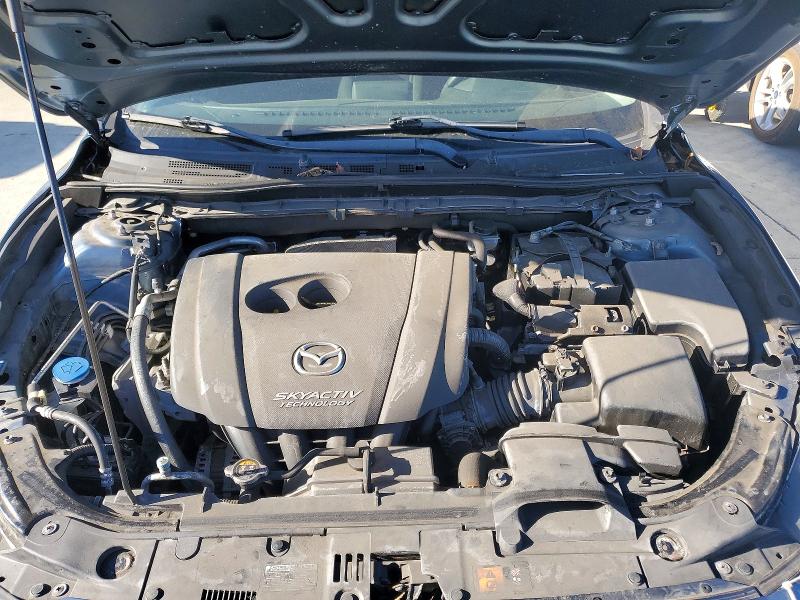 Photo 11 from auction – 2014 MAZDA 3 with VIN JM1BM1K7XE1217599