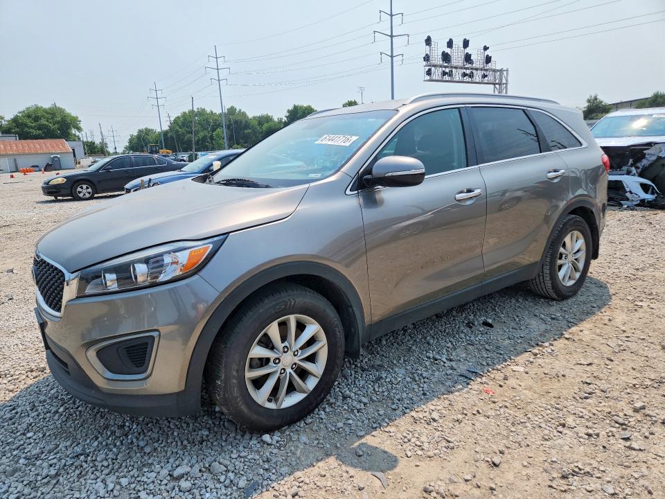 KIA SORENTO 2016 with VIN 5XYPG4A31GG101885 - Photo from auction