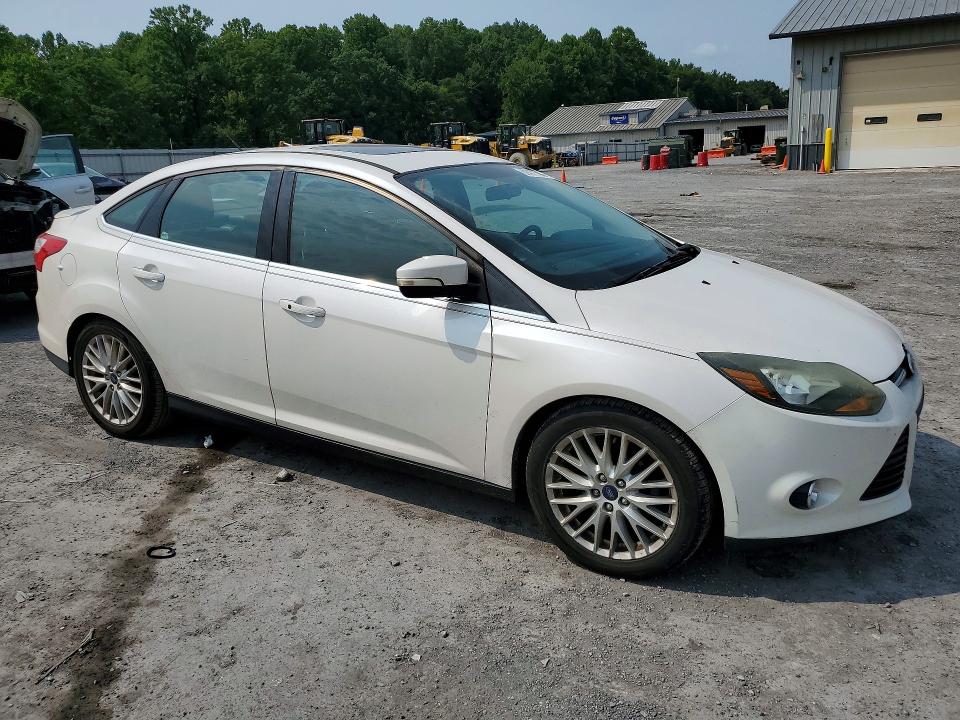 Photo 4 from auction – 2014 FORD FOCUS with VIN 1FADP3J21EL416231