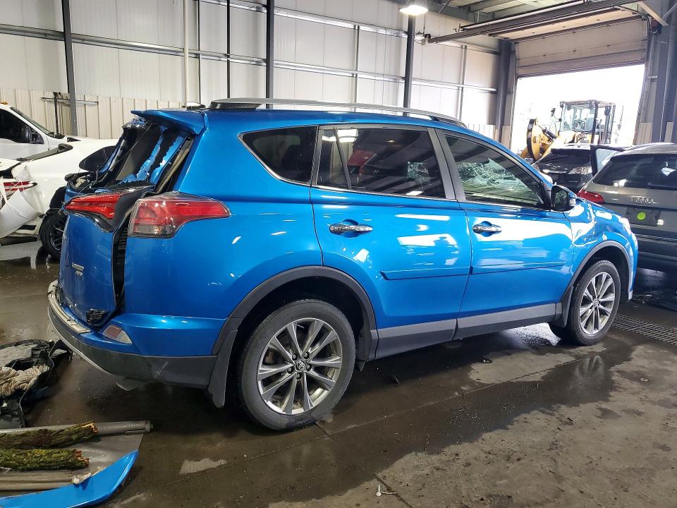 Photo 3 from auction – 2018 TOYOTA RAV4 with VIN JTMDFREVXJJ216880