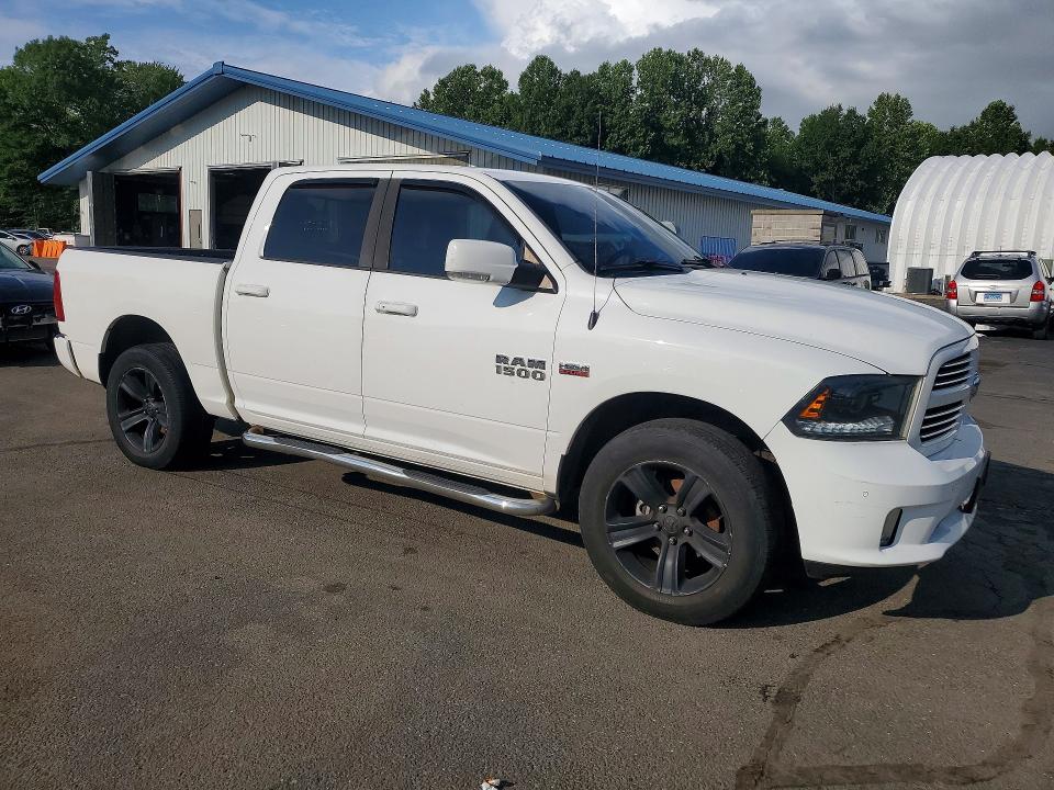 Photo 4 from auction – 2015 RAM 1500 with VIN 1C6RR7MT6FS558353