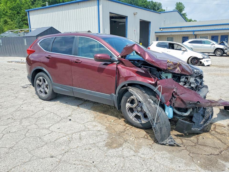 Photo 4 from auction – 2018 HONDA CR-V with VIN 7FARW2H80JE017965