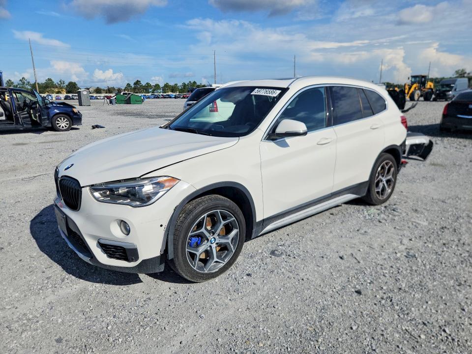BMW X1 2017 with VIN WBXHT3C3XH5F72182 - Photo from auction