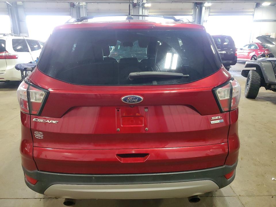 Photo 6 from auction – 2018 FORD ESCAPE with VIN 1FMCU9HD7JUC35305