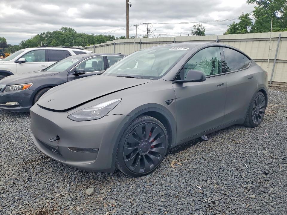 TESLA MODEL Y 2023 with VIN 7SAYGDEF1PF869210 - Photo from auction