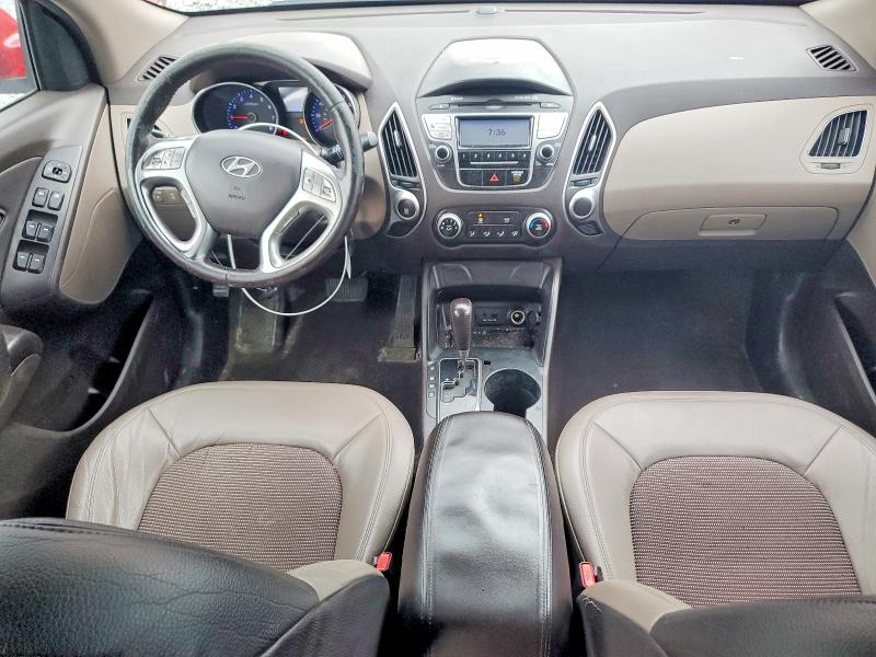 Photo 8 from auction – 2010 HYUNDAI TUCSON with VIN KM8JUCAC6AU021685
